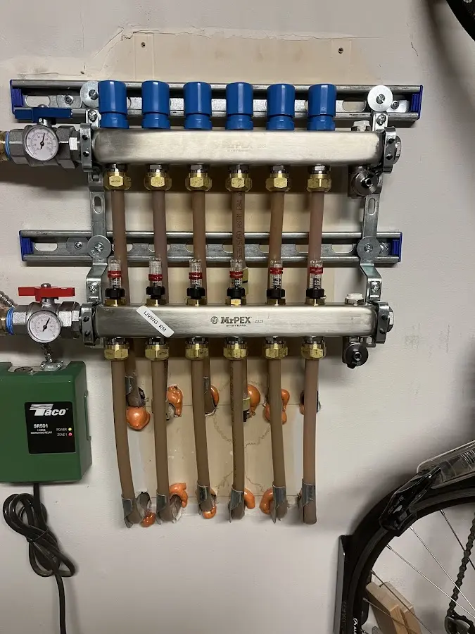 Plumber performing Gas Line Installation at a residential property in Clark